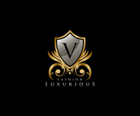 Luxury Golden Shield Logo with V Letter,  royal shield logo icon.