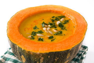 Pumpkin and carrot soup isolated on white background. Autumn food. 