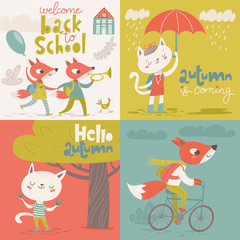 Set of four vector vintage style welcome back to school designs with cartoon animals.