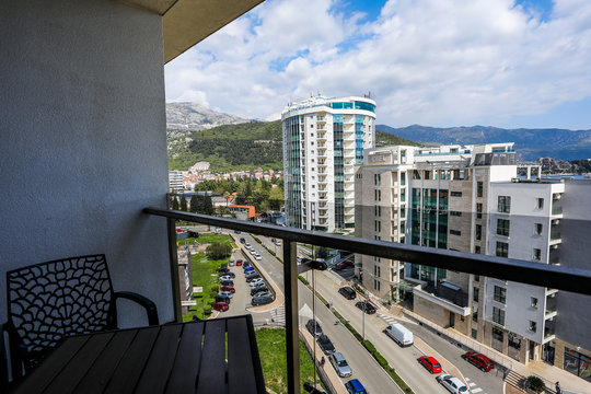 Dining Area On The Balcony Overlooking The City