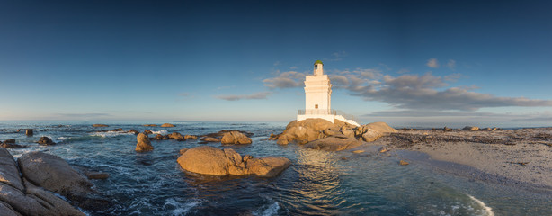 Wide angle panoramic image of the Stompneusbaai lighthouse near Shelley point in town of St Helena...
