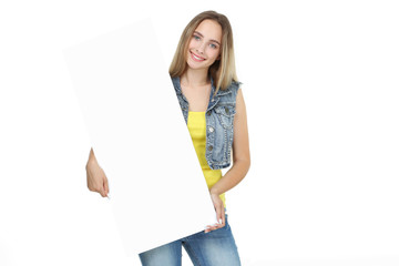 Beautiful young woman holding blank board on white background