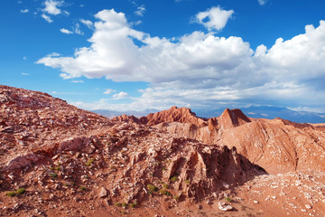 View of the Mars Valley near San Pedro de Atacama against a blue dramatic sky.