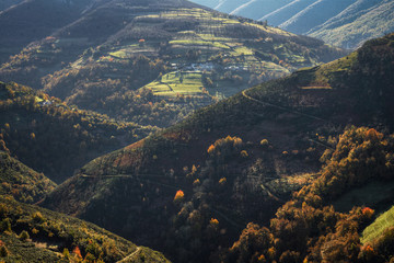 Autumnal Landscape of Hills covered with Deciduous Forests