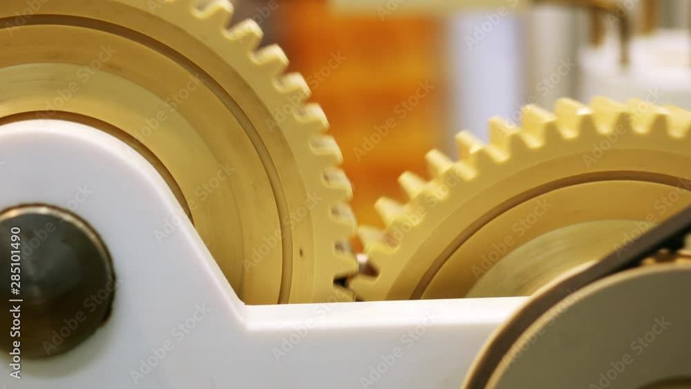 Aufkleber close-up view of modern mechanism with plastic rotating gears. media. different working devices coll