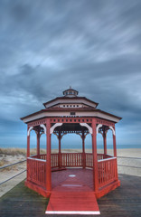 Quiet dusk view of a ocean shore and gazebo
