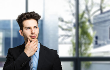 Young businessman having an idea