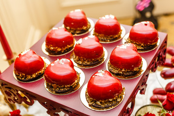 Festive cakes in a shape of heart. St. Valentine's Day, Mother's Day, Birthday, Wedding banquet