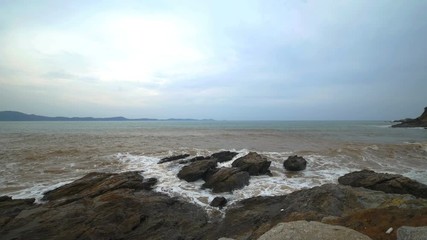 4k video of sea wave with stone at Khao Laem Ya in Mu Ko Samet National Park, Rayong Province, Thailand