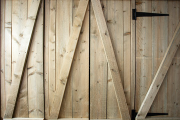 Traditional wooden barn doors detail of farm house doors, close-up clean and modern