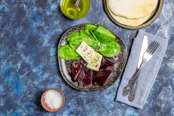 Beetroot, spinach and cheese salad. Healthy eating. Vegetarian food.