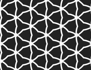 Fototapeta premium Vector seamless geometric pattern. Shaped white barbed wires and triangles, black background.