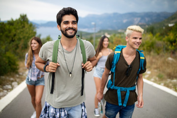 Group of happy friend traveler walking and having fun. Travel lifestyle and vacation concept