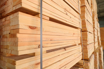 Folded wooden board on the sawmill.