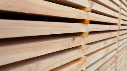 Folded wooden beam on the sawmill.