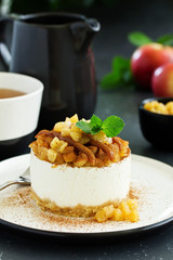 Cheesecake with apples and caramel. New Year's dessert. Selective focus