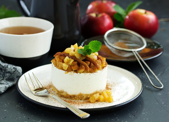 Cheesecake with apples and caramel. New Year's dessert. Selective focus