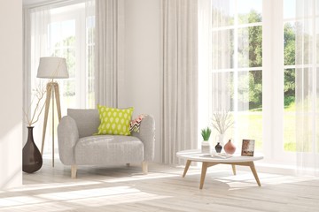 Mock up of stylish room in white color with armchair and green landscape in window. Scandinavian interior design. 3D illustration