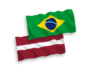 Flags of Latvia and Brazil on a white background