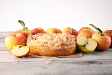 Apple pie or homemade cake with apples on wood. Delicous dessert apple tart