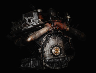  Car engine on black background