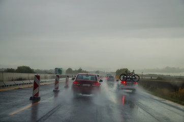 Obraz na płótnie Canvas rainy day in the highway