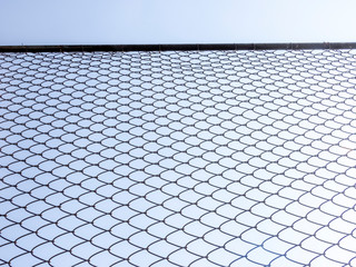 blue sky through a metal grid in Brazil