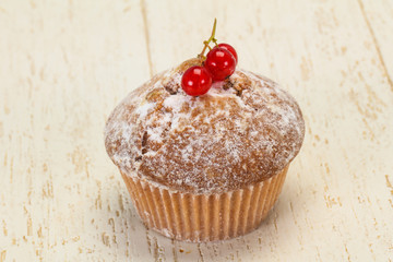 Sweet tasty muffin with red currants