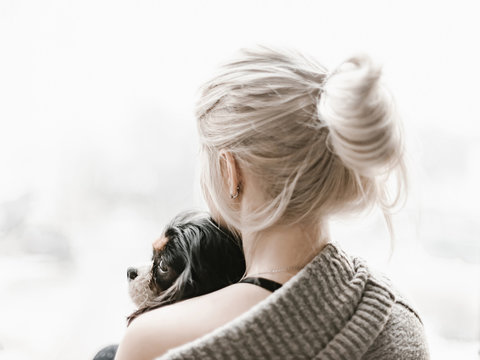 Blonde woman with cute dog
