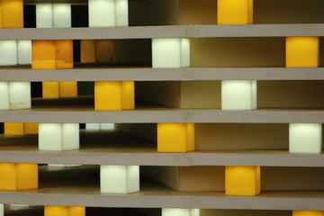Horizontal rows with yellow and white cubes, concept geometric texture for background
