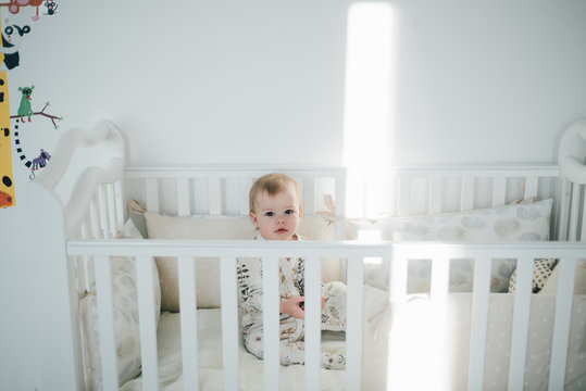 Cute toddler in cradle