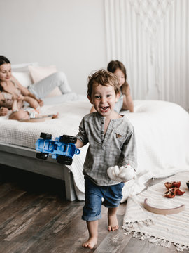 Happy boy with toy car