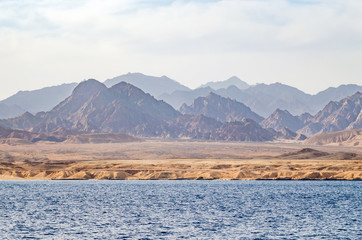 Mountain landscape with blue water in the national park Ras Mohammed, Egypt.