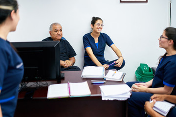 Students learning from a senior doctor