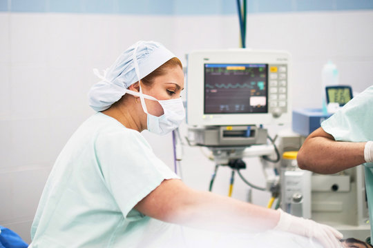 Skilled nurse preparing for an operation