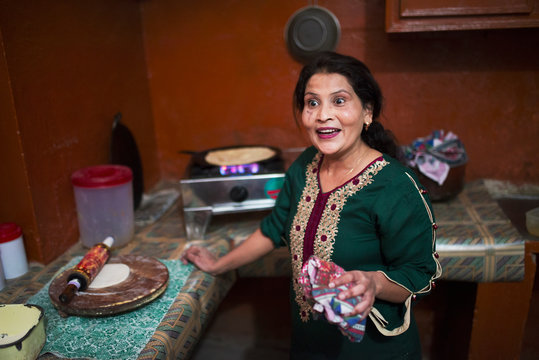 Woman cooking in Punjab, Pakistan