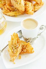 Honey baklava with nuts. Eastern sweetness. Selective focus