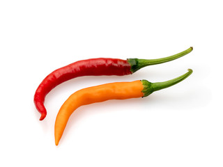 Two chili peppers. Food on a white background. Seasoning ingredient.