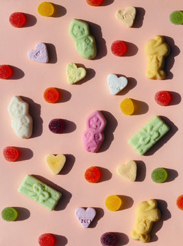 Dutch traditional Sinterklaas candy on a light salmon background