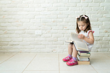 Toddler Learning To Read Books At Home