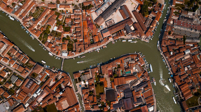 Aerial shot of cityscape with colorful roofs