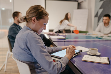Group of people having a meeting in the modern office