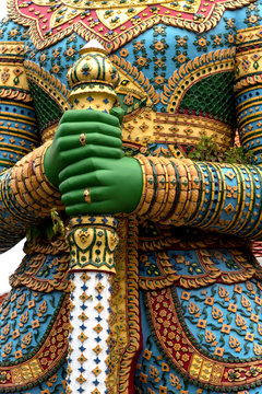 Statue of demon guardian in Buddhist temple