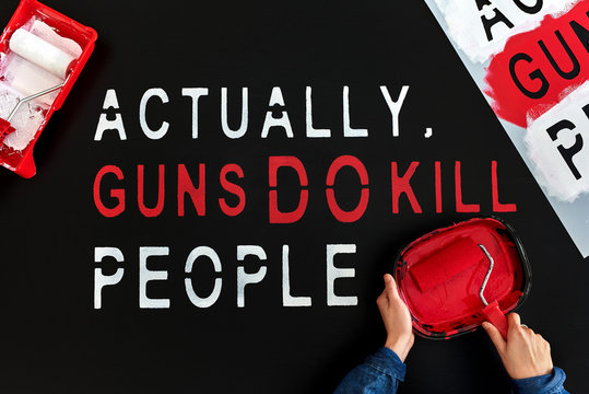 Overhead of person making protest sign for march