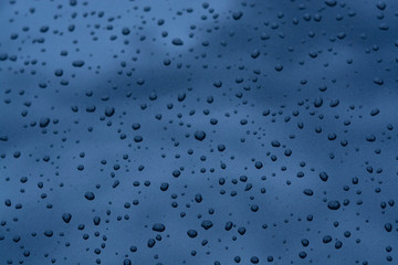 Abstract background with water drops on metal surface