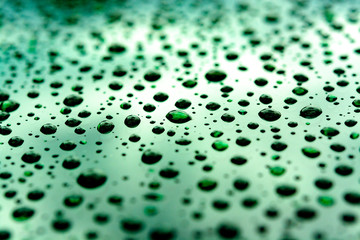 Abstract background with water drops on metal surface