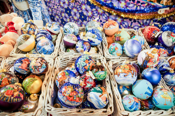 Large Christmas balls in baskets.