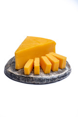 Cheddar cheese collection, piece of yellow Cheddar cheese made from cow milk