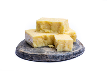 Cheddar cheese collection, block of Cheddar cheese made from cow milk