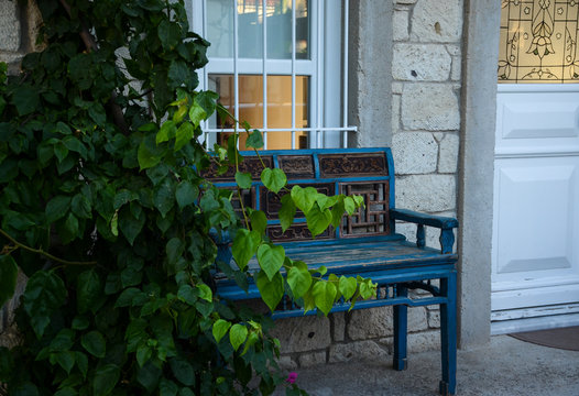 Antique blue wooden bench at outdoor. Vintage bench